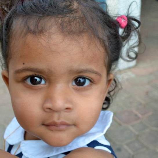 Close-up of my daughter looking at the camera, December 2010